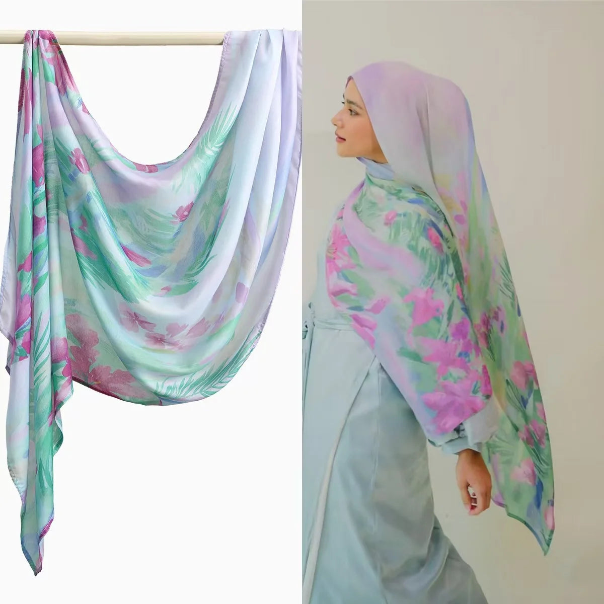 Eine Frau trägt einen hellblauen Hijab mit Aquarellmuster in rosa und grünen Blumenmotiven.