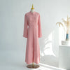 A pink elegant two-piece Arabic modest set displayed on a mannequin against a white background.