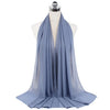 A light blue chiffon hijab scarf draped around a mannequin's neck.