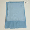 A light blue soft modal rayon hijab set folded and displayed flat.