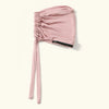 A soft pink elegant anti-slip inner hijab cap with a drawstring detail.