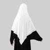 A woman wearing a white hijab and black clothing.