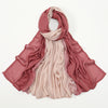 Écharpe hijab fluide en modal dégradé de rose poudré et beige.