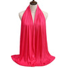 A bright pink premium modal jersey hijab draped around a mannequin's neck.