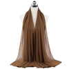 A brown chiffon hijab scarf draped over a mannequin.