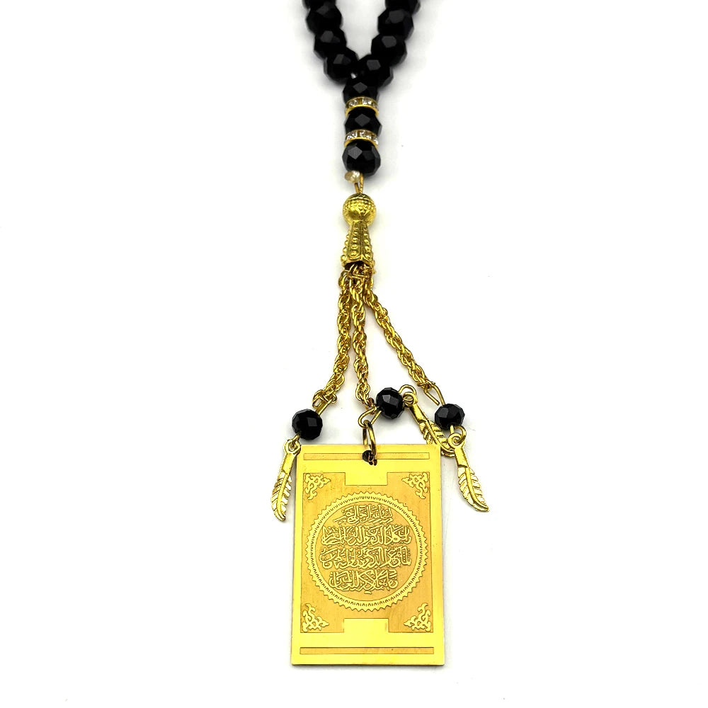 Edelstahlkette mit schwarzem Perlenband und goldfarbener Anhänger mit arabischer Kalligrafie
