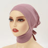 A model wearing a dusty rose colored inner hijab cap scarf