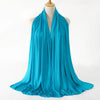 A vibrant turquoise premium modal jersey hijab draped around a mannequin's neck.