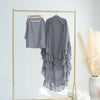 A gray ruffled 2-layer chiffon hijab displayed on a gold hanger against a white background.