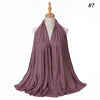 Mauve gerilltes Strick-Hijab-Tuch, drapiert auf einem Mannequin.