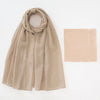 A beige chiffon hijab and undercap set displayed flat.