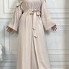 A beige elegant women's abaya and kaftan set displayed on a mannequin.