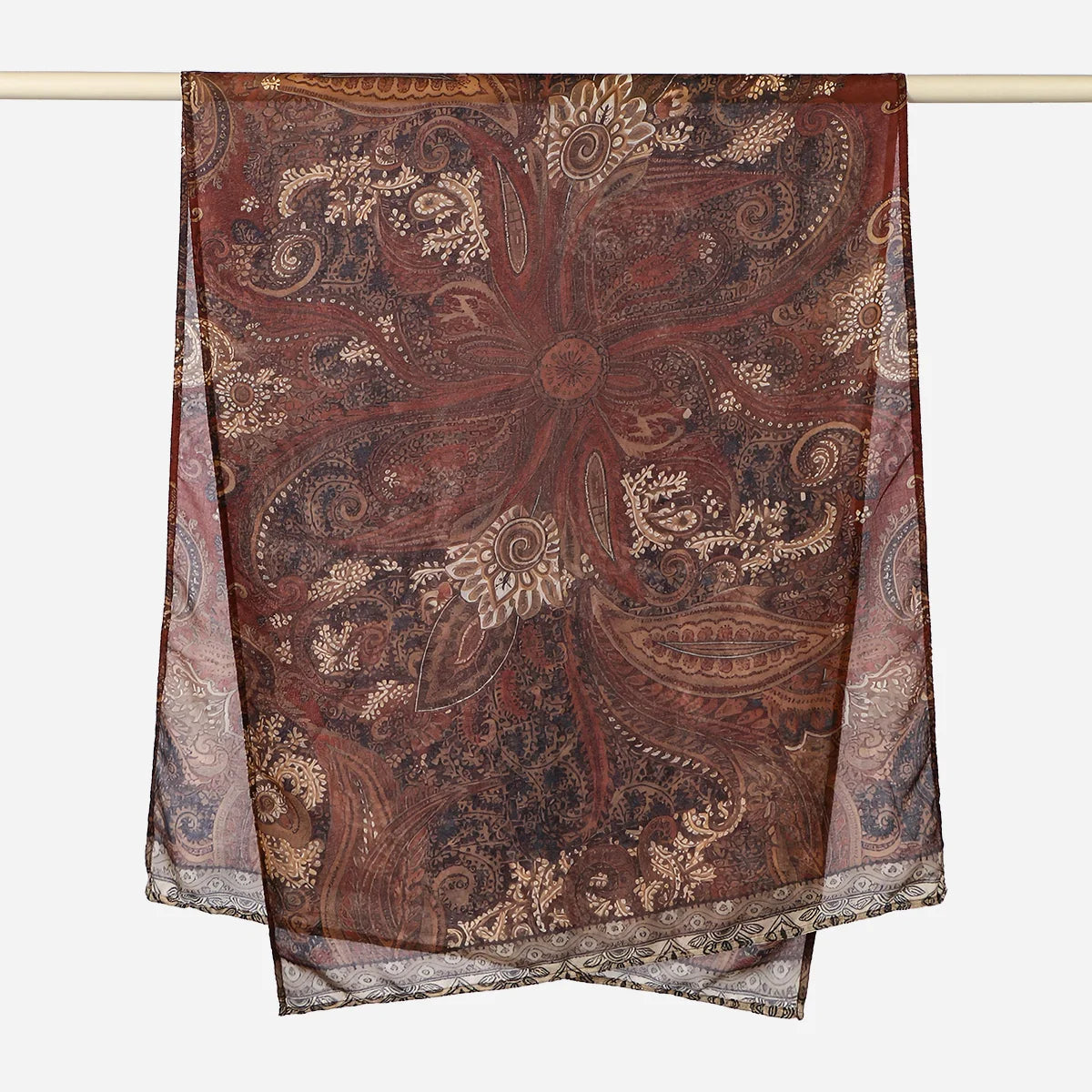 A dark brown printed linen hijab scarf featuring intricate floral and paisley patterns.