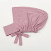 A soft mauve inner hijab cap scarf made of cotton polyester with a gathered knot detail.