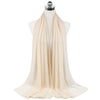 A beige chiffon hijab scarf draped around a mannequin neck.