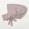 A soft mauve inner hijab cap scarf made of cotton polyester with a gathered knot detail.