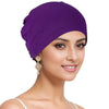 A woman wearing a purple breathable cotton underscarf with an elastic fit