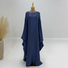 Elegante königsblaue, langärmelige Abaya auf einem Mannequin.