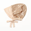 A beige satin hijab cap and undercap set with a gathered fabric top and tied bow detail.