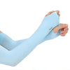 Light blue cooling UV protection arm sleeves being worn on an arm.