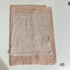 A light beige soft modal rayon hijab set for women, folded and displayed flat.