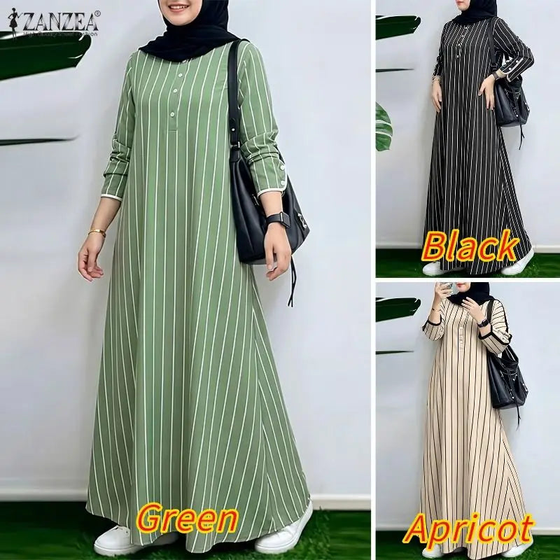 Eine Frau modelliert ein langes, gestreiftes Maxi-Kleid in grün und weiß für konservative Kleidung.
