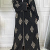 Abaya kaftan islamique noire élégante avec broderie dorée et doublure blanche