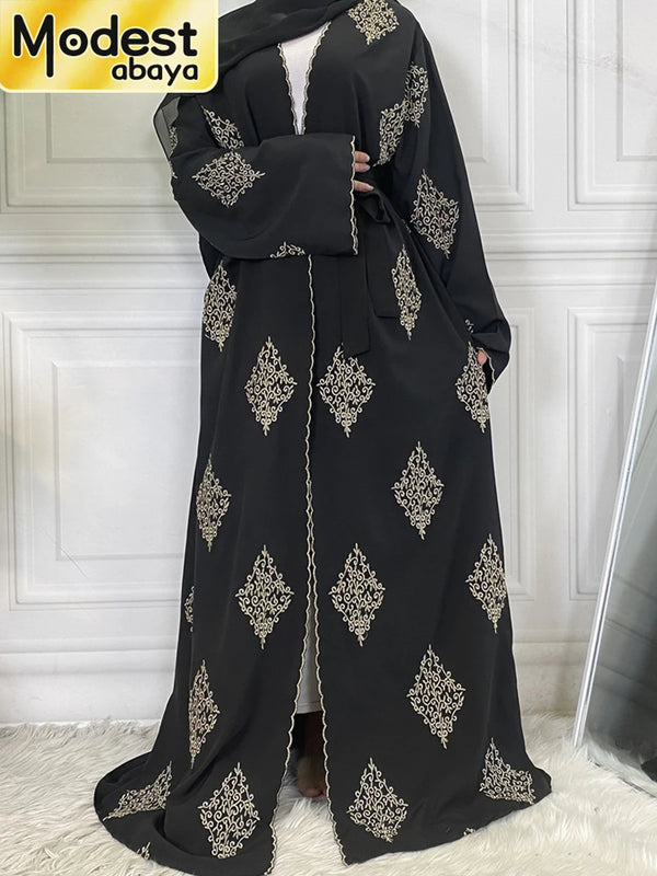 Black elegant Islamic abaya kaftan with gold embroidery and white lining
