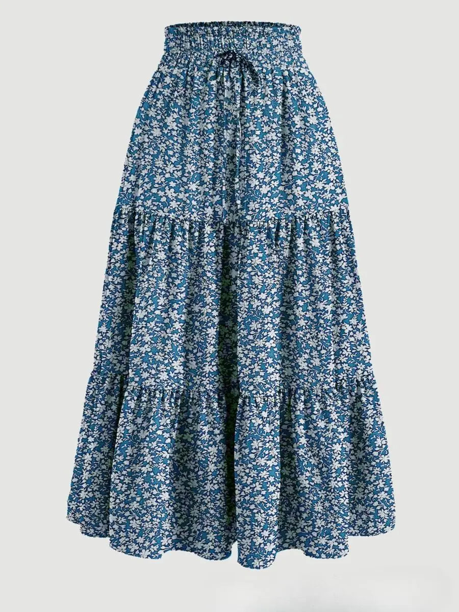 Falda midi a-line bohemia azul y blanca floral con cintura fruncida.