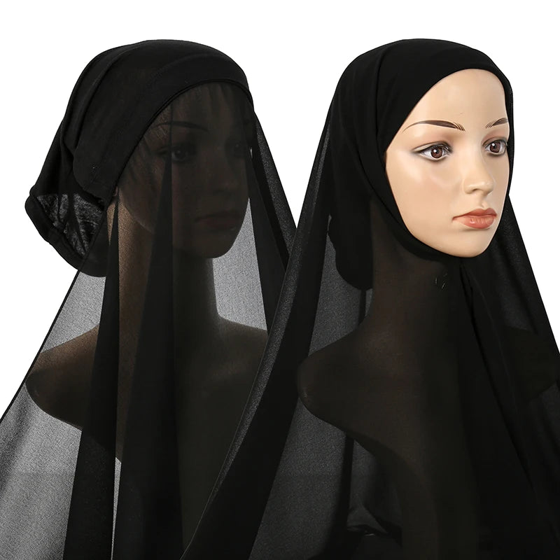 A woman wearing a black chiffon instant hijab with a modal cotton cap, shown in a close-up profile view.