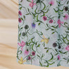 Light blue watercolor printed scarf hijab featuring green and pink floral vines