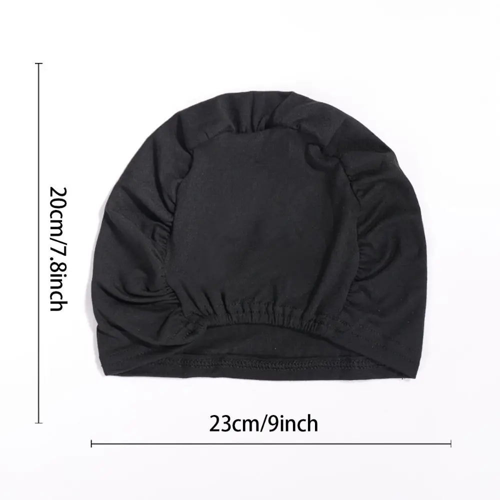 Black breathable cotton underscarf with elastic fit shown flat