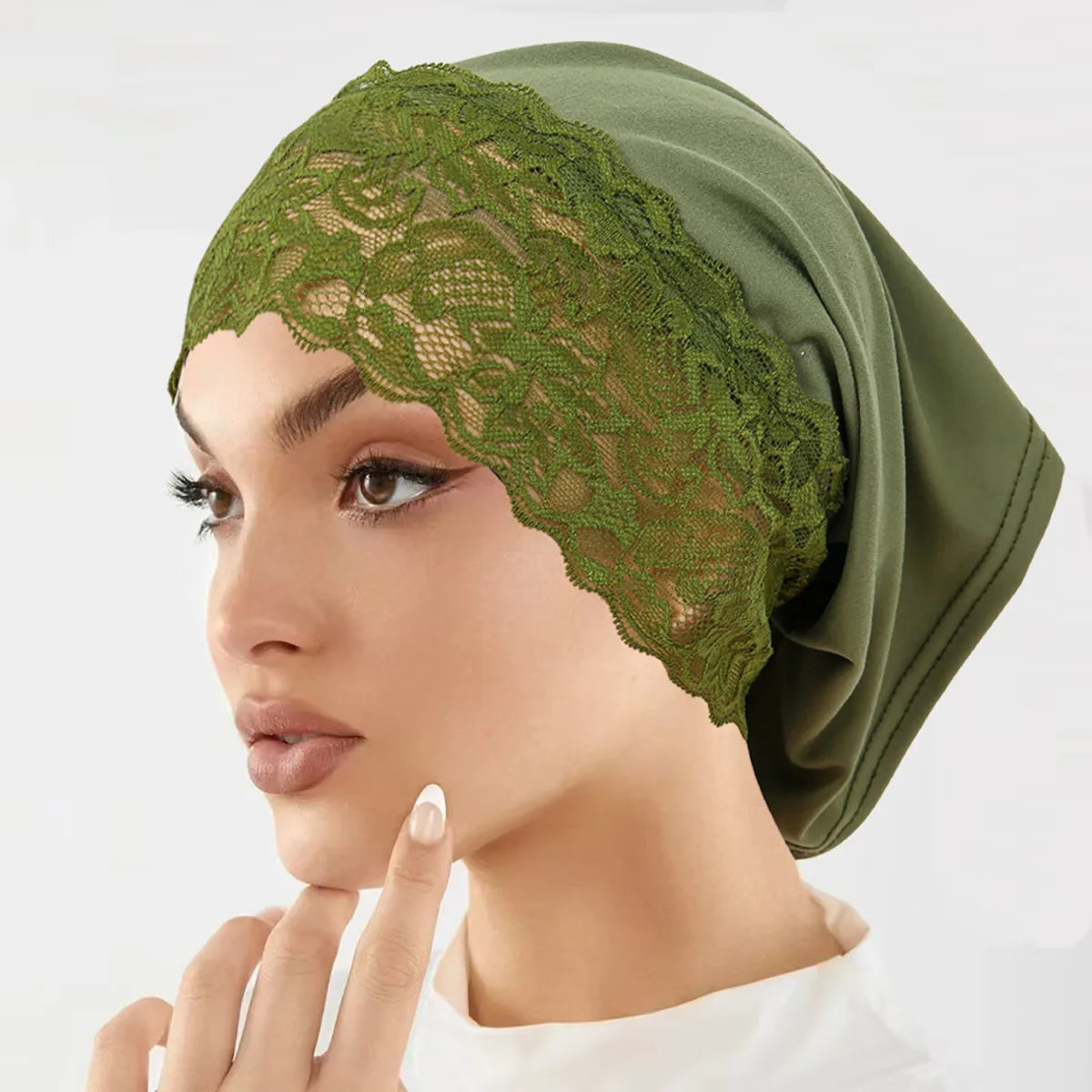Model wearing olive green lace knit inner hijab undercap turban bonnet