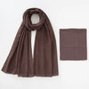 A dark brown chiffon hijab and underscarf set displayed flat.