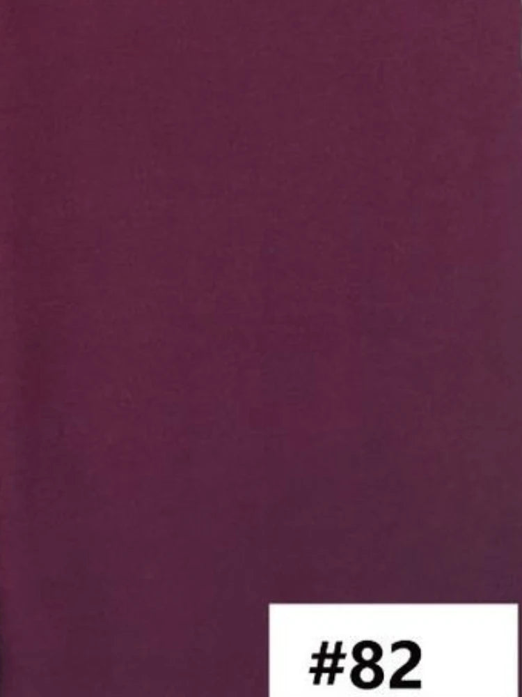 Fond en tissu de couleur magenta foncé ou prune.