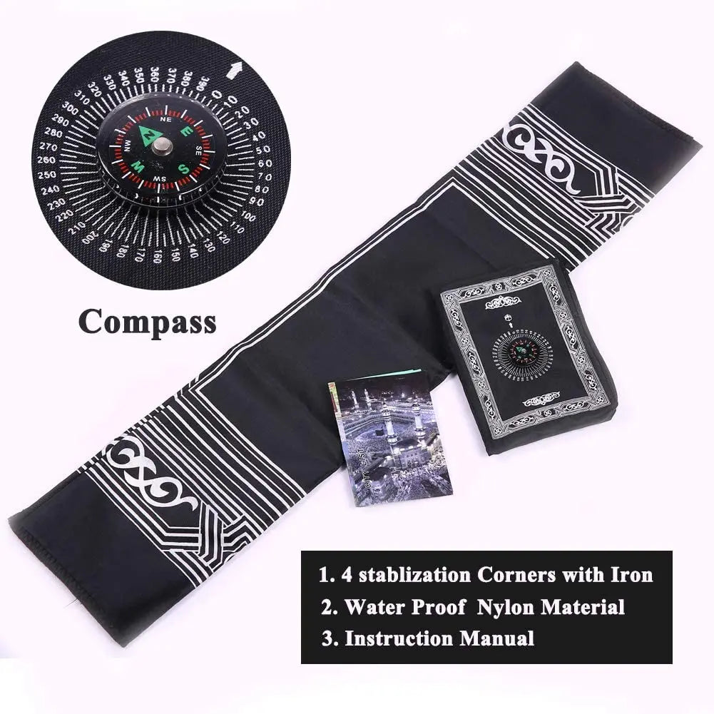 A black portable braided prayer rug featuring a compass and instruction manual.