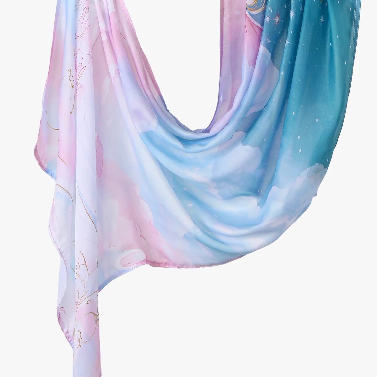 A flowing, light blue and pink printed linen hijab scarf draped elegantly.