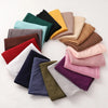 A circular arrangement of various colored premium modal jersey hijabs for women.